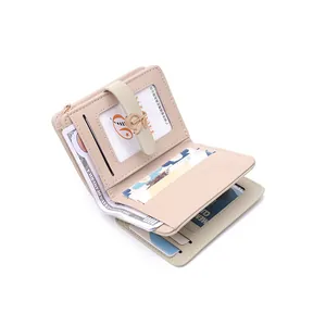 Detailed view of women's short PU leather wallet interior with multiple card slots