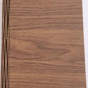 Macro view showing the natural wood grain texture of a foldable LED book lamp cover
