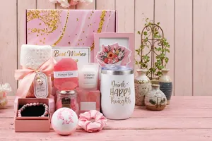 Detailed layout of the pink spa gift set with scented candle, tumbler, and bath essentials.