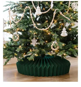 Detail of dark green pleated Christmas tree skirt base collar decoration