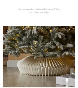 Detail view of white pleated Christmas tree skirt base for festive holiday decor