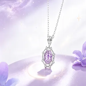 Close-up of hexagonal silver necklace with purple gemstone in dreamlike setting