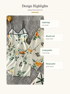 Close-up detail of yellow floral satin pajama set with cami top and loungewear pants