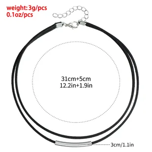 Double-layered black velvet cord choker with a silver curved tube pendant
