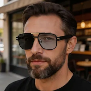 Close-up of men's retro double-bridge sunglasses with black metal frame and grey lenses.