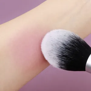 Professional soft bristle makeup brush for powder and blush application on skin