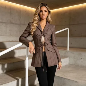 Chic chocolate brown blazer with tie-front cut-outs and pleated irregular hem detail.