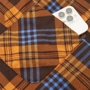 Mens plaid flannel shirt detail showing pocket with smartphone for size reference