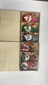 Hand-painted wooden Christmas gnome hanging ornaments set in a rustic wooden display box