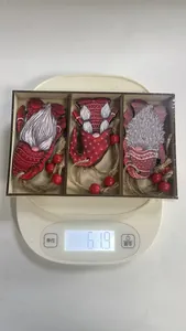 Wooden Christmas gnome ornaments set of 3 in box, weighing 61.9 grams on scale