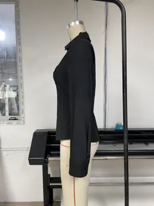 Detailed side view of a slim fit black long-sleeved V-neck blouse for women on mannequin