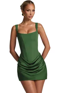 Close-up of elegant green square neck corset mini dress with draped ruched skirt detail