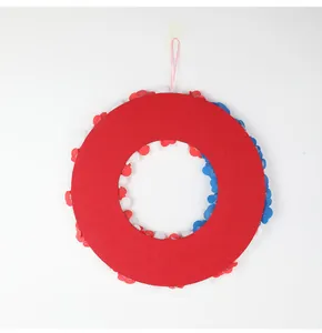 Back view of USA Independence Day wreath with red felt base and pink hanging loop
