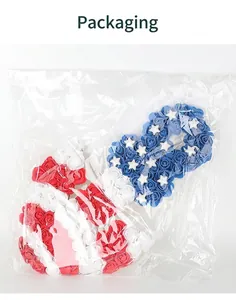 Patriotic USA flag theme heart-shaped rose wreath in plastic packaging detail