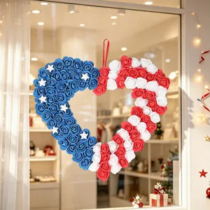 Heart-shaped USA Independence Day wreath with red white and blue artificial roses