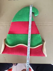 Measurement showing height of about 40cm for the red and green Christmas elf hat