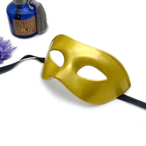 Detail showing the elegant gold metallic finish of this half-face masquerade mask