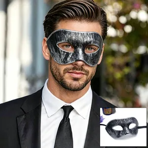 Close-up detail of vintage silver and black men's masquerade eye mask for Halloween