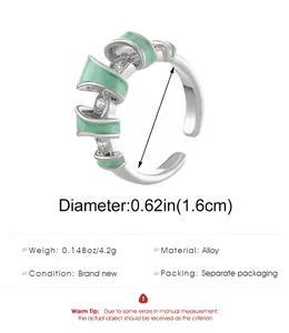 Detail view of a geometric enamel alloy ring with diameter and weight specifications.