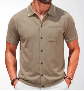 Close-up of men's short-sleeve knitted polo cardigan in khaki with white piping details.