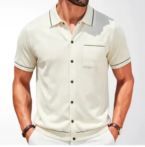Detailed view of a men's knit polo cardigan with contrast piping and a chest pocket.