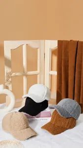 Detailed view of plush sherpa baseball hats in various colors for winter warmth