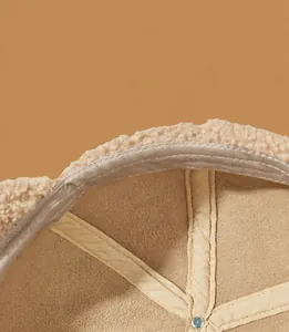 Detail of the soft fleece lining inside a winter baseball cap for superior warmth