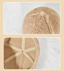 Close-up of warm brown lamb wool baseball cap showing soft fabric and fleece lining