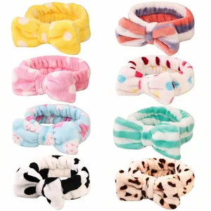 Detailed view of soft coral fleece bowknot headbands in eight different cute patterns