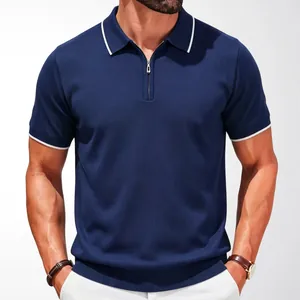 Navy blue half-zip knitted polo shirt with white contrast tipping on collar and cuffs