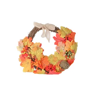 Autumn maple leaf wreath with burlap bow and lotus pod for Thanksgiving door decor