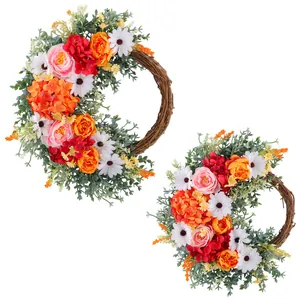 Artificial rose and daisy floral wreath on grapevine base for festive home door decor