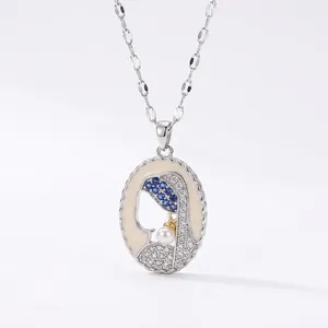 Artistic enamel necklace featuring the Girl with a Pearl Earring design with crystals