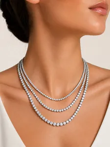 Triple layered silver stainless steel sparkling zircon tennis necklace on model's neck