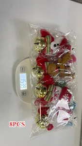 Package containing 8 pieces of plush Christmas ornaments with bells, weight details.