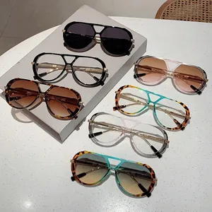 Detailed view showing a collection of retro double-bridge sunglasses and optical frames.