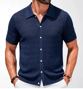 Macro detail of navy blue knit polo shirt showing the breathable jacquard pattern