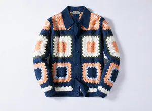 Close-up detail of navy blue crochet knit cardigan with hollow out pattern for men