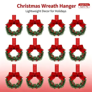 Lightweight small Christmas wreath hangers with red bows and berries for festive holiday decor