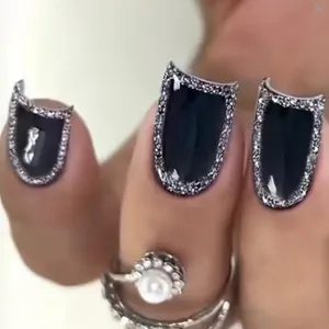 Elegant short square black press-on nails featuring silver glitter border French design