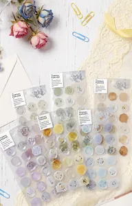 Translucent wax seal stickers with floral patterns in various pastel colors