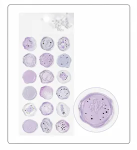 Detailed close-up showing translucent purple wax seal stickers with floral and heart patterns