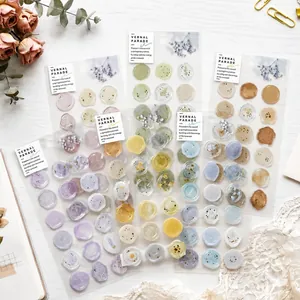 Decorative translucent floral wax seal stickers set in varied pastel colors and patterns
