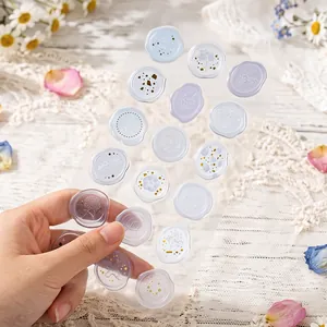 Semi-transparent faux wax seal stickers with delicate floral patterns for sealing