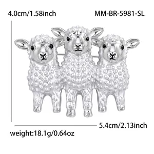 Detailed view of three-lamb silver brooch showing dimensions 5.4x4.0cm and weight 18.1g