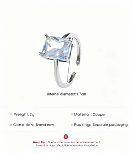 Detailed view of copper ring with rectangular blue cubic zirconia and 1.7cm diameter