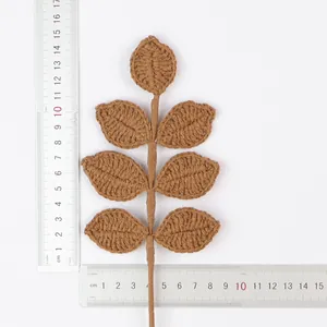 Detail of handmade crochet leaf branch showing size and approx 10g weight.