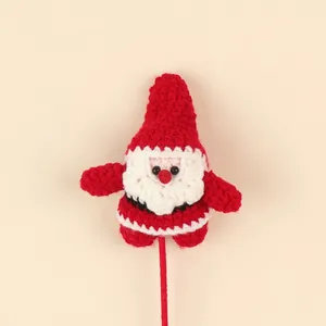 Handmade crochet Santa Claus decoration for Christmas flower bouquets and gift crafts.