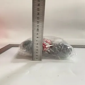 Height measurement of Christmas faceless gnome plush dolls in transparent packaging