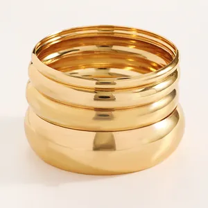 Detail view of vintage gold smooth surface wide bangle bracelet set for women 10-piece